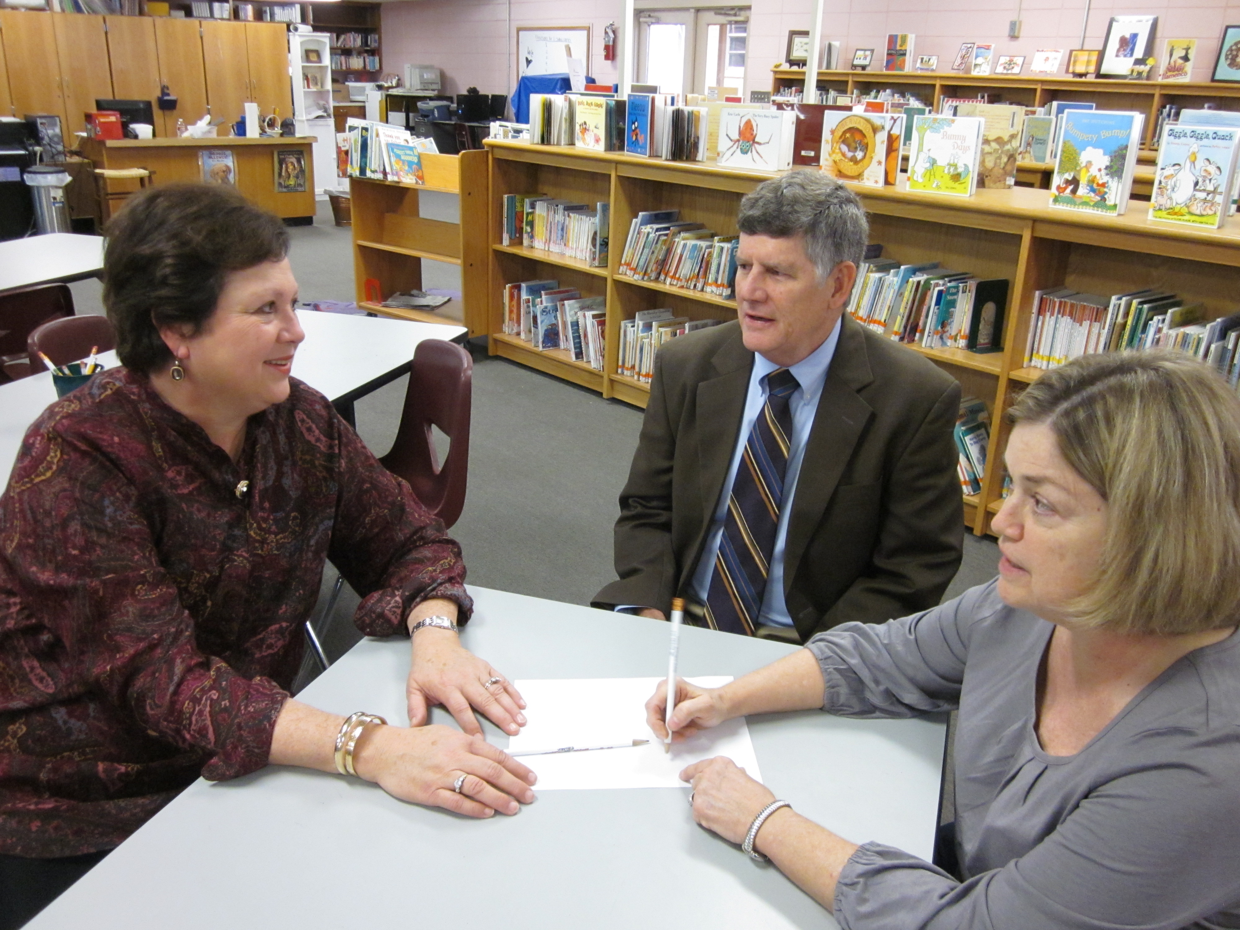 PHOTO:  From left, Dean of Delta State’s College of Education Dr. Leslie Griffin plans the announcement of the Bill and Cheryl Thomas Marchant Scholarship with Clay and Beverly McWilliams.